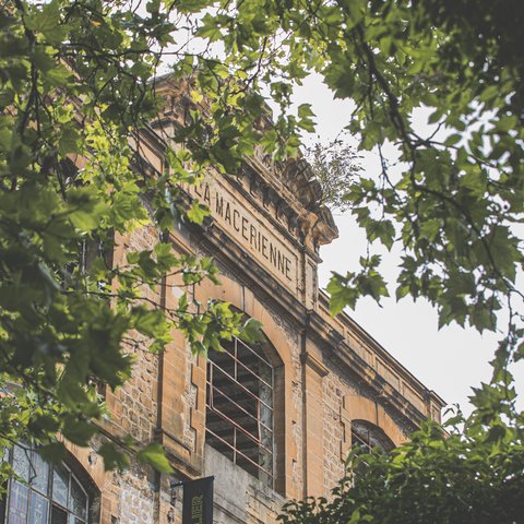 La Macérienne derrière les arbres